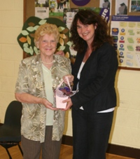 Diocesan Communications Officer Karen Bushby receives a gift from Ballymacash Monday Club Chairperson Lily Armstrong.